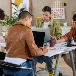 full-shot-people-working-together